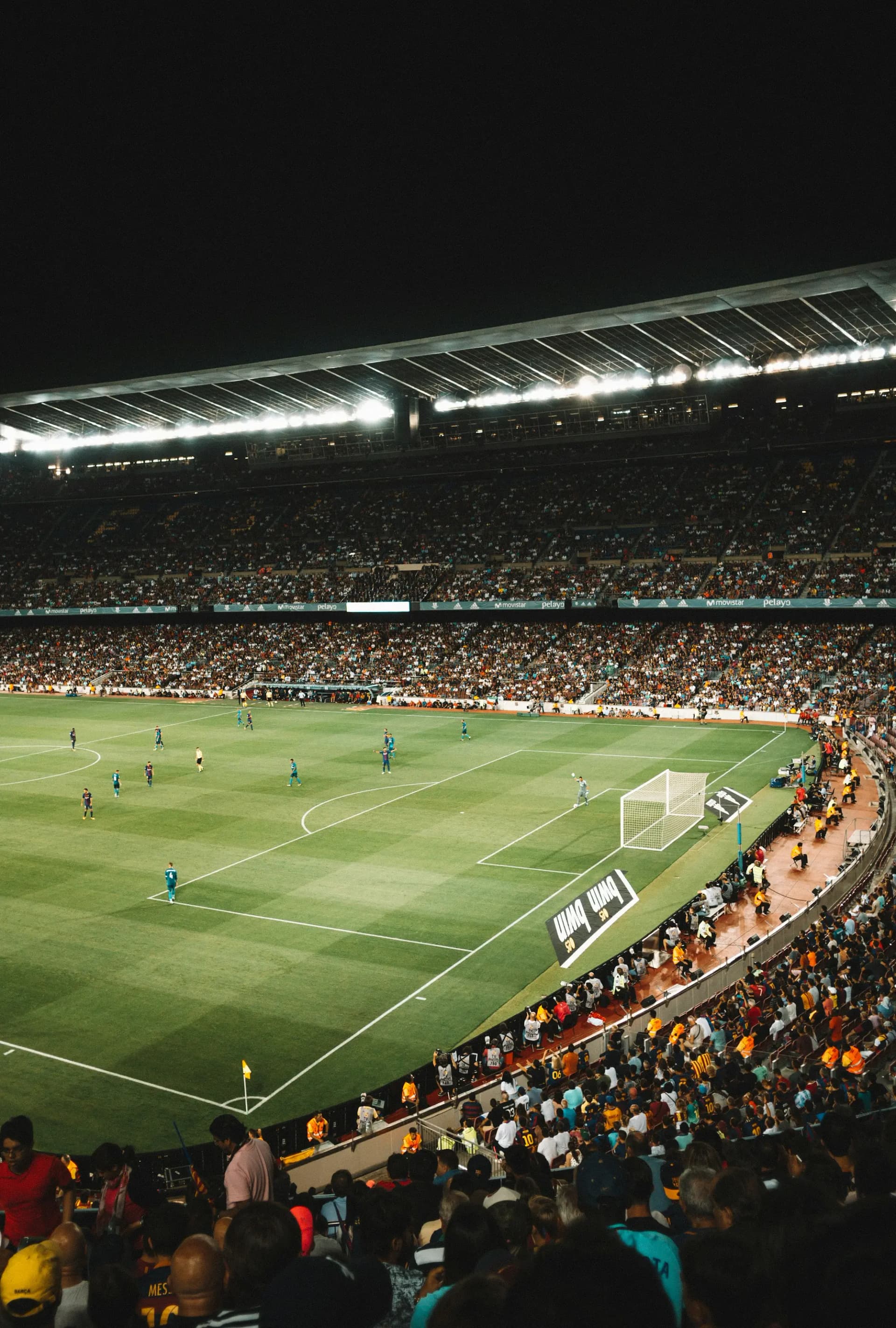 Empty floodlit pitch at night